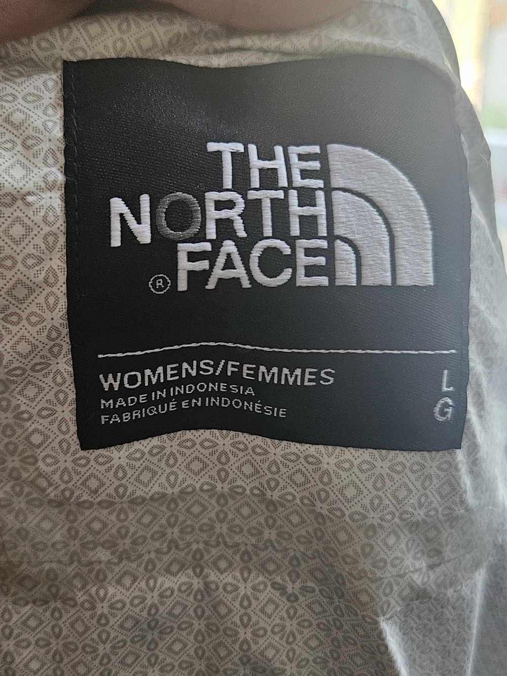 Women's NorthFace Light Aqua Hooded Rain Jacket